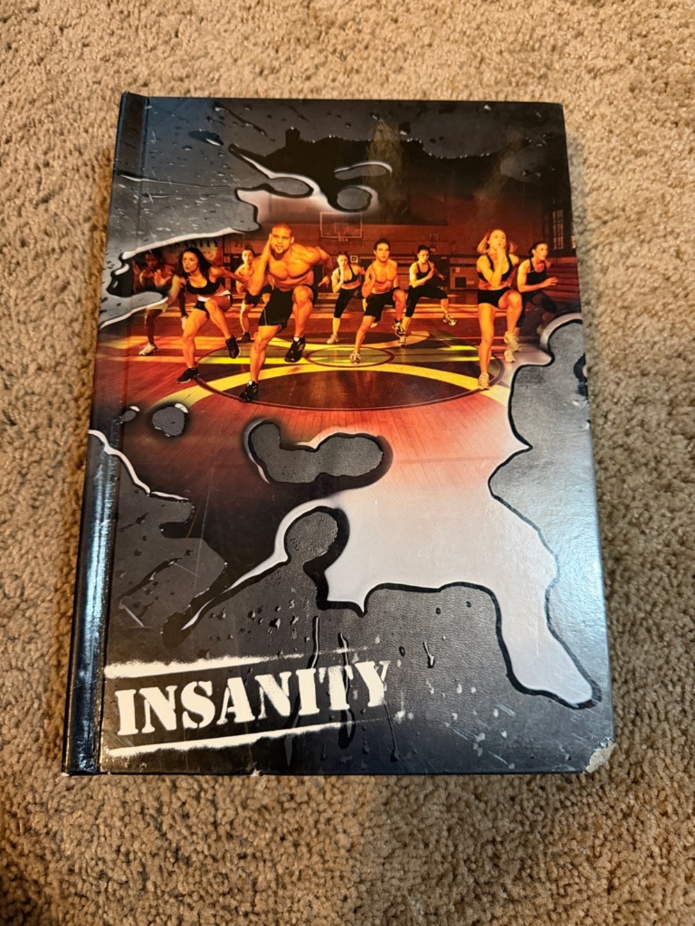 Insanity 10 piece CD workout series in box.